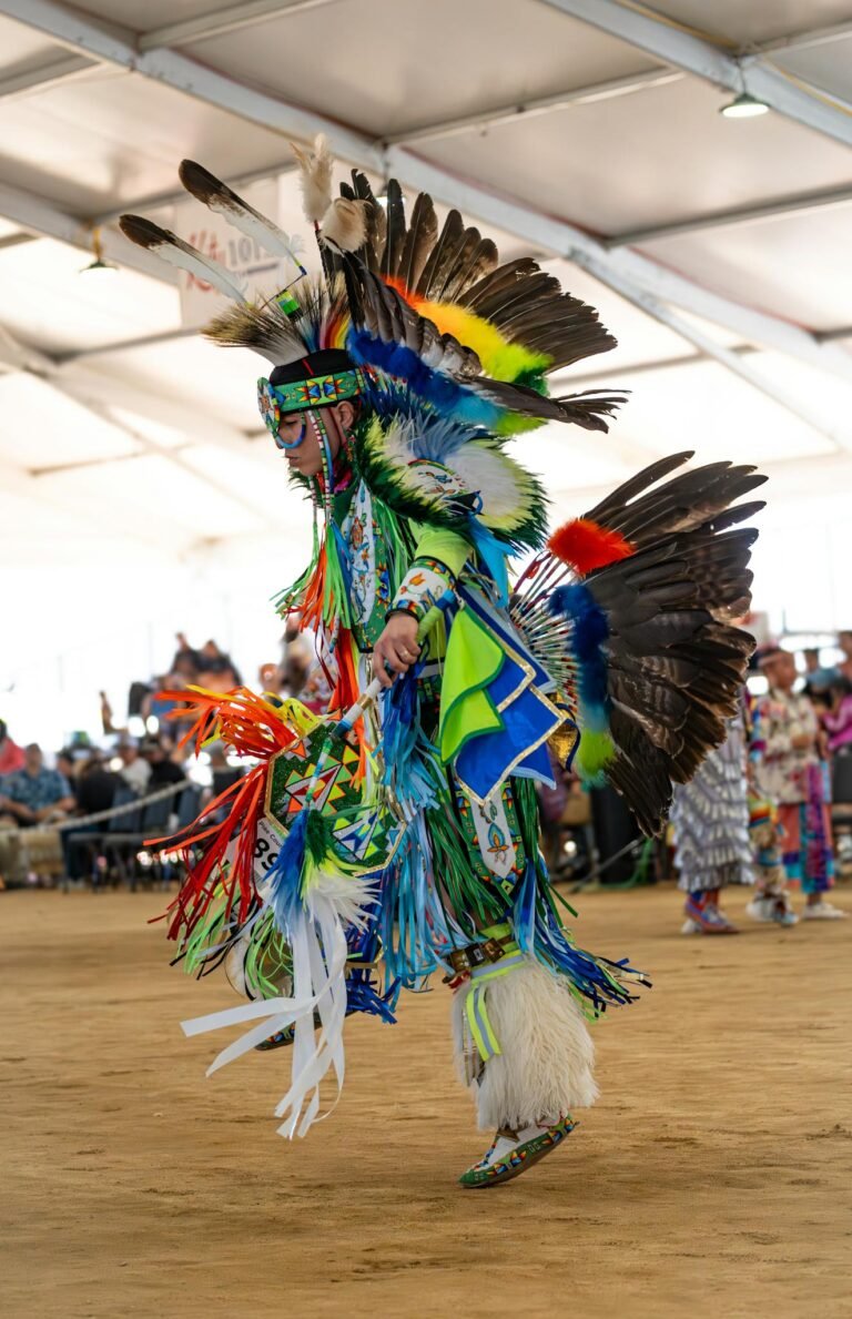 Dynamic capture of a Native American dancer in colorful regalia at a Cabazon, CA pow wow.